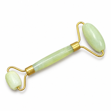 Charger l'image dans la galerie, Pale green dual-ended jade facial roller with gold-tone frame on a white background