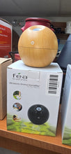 Load image into Gallery viewer, FEA ultrasonic aroma humidifier with its product box
