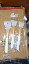 Load image into Gallery viewer, Original photo of three individually wrapped applicators
